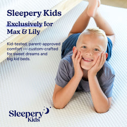 Sleepery Kids exclusive for Max & Lily: smiling child lying on white quilted kids mattress, showcasing kid-tested, parent-approved comfort for big kid beds.