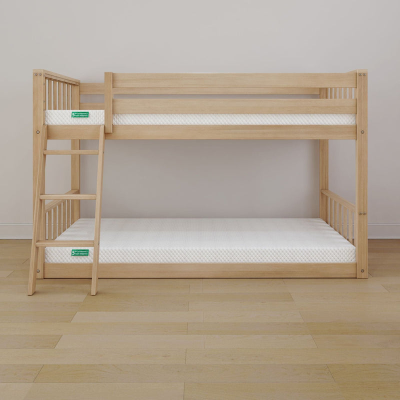 Natural light wood twin bunk bed with ladder and white mattresses, space-saving kids' bedroom furniture