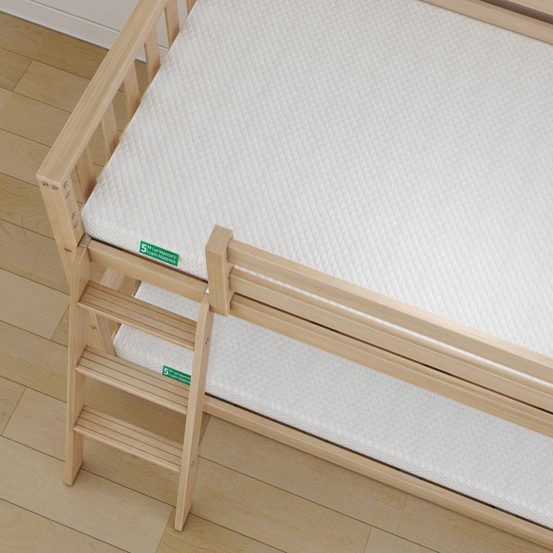 Top-down view of a natural wood bunk bed with ladder and two white 5-inch gel memory foam mattresses on light hardwood floor