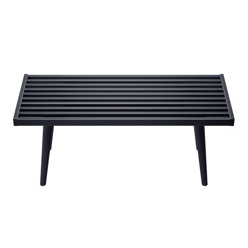 Modern black slatted coffee table with sleek minimalist design and angled legs.