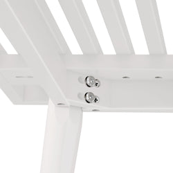 Close-up view of white metal bench structure showing stainless steel screws and assembly details for outdoor furniture.