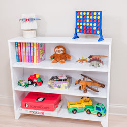 Children's bookshelf with toys, books, board games, and a Connect Four game.