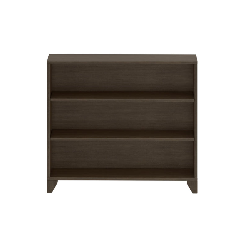 Dark brown three-shelf wooden bookcase with open storage and tapered legs, modern compact bookshelf for living room or home office