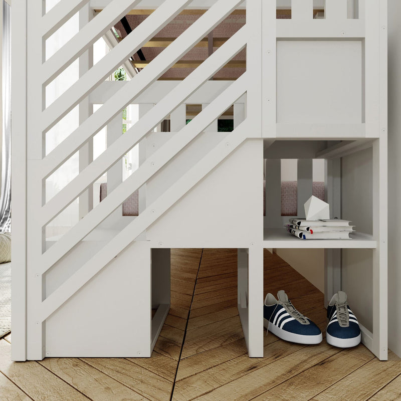 White wooden loft bunk bed with diagonal slat railing and built-in storage cubbies, stacked books and navy sneakers on hardwood floor, modern kids' bedroom furniture