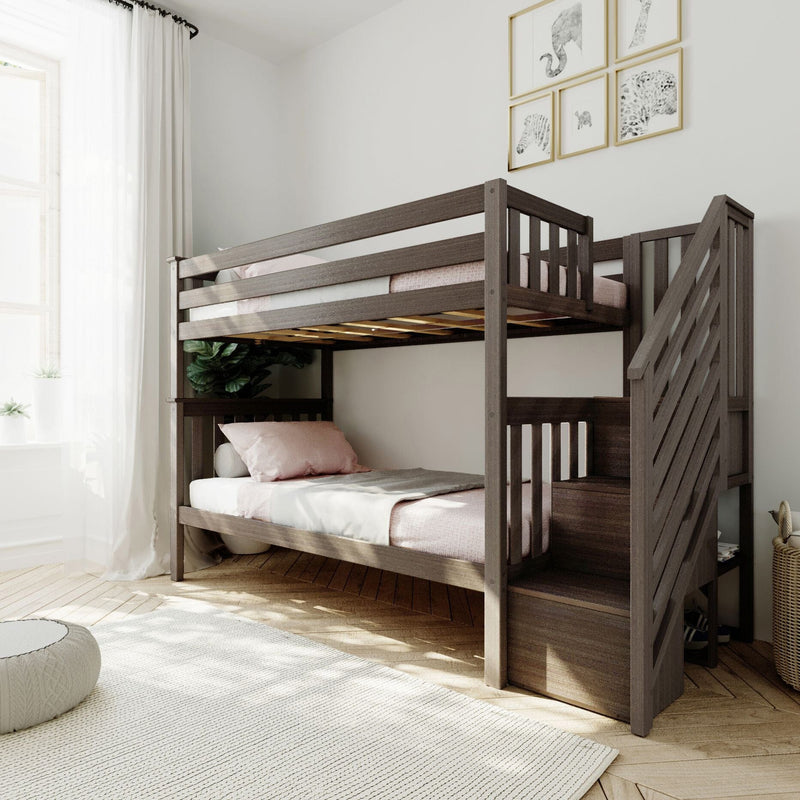 Modern dark wood bunk bed with stairs in bright kids' bedroom, pink bedding and neutral decor