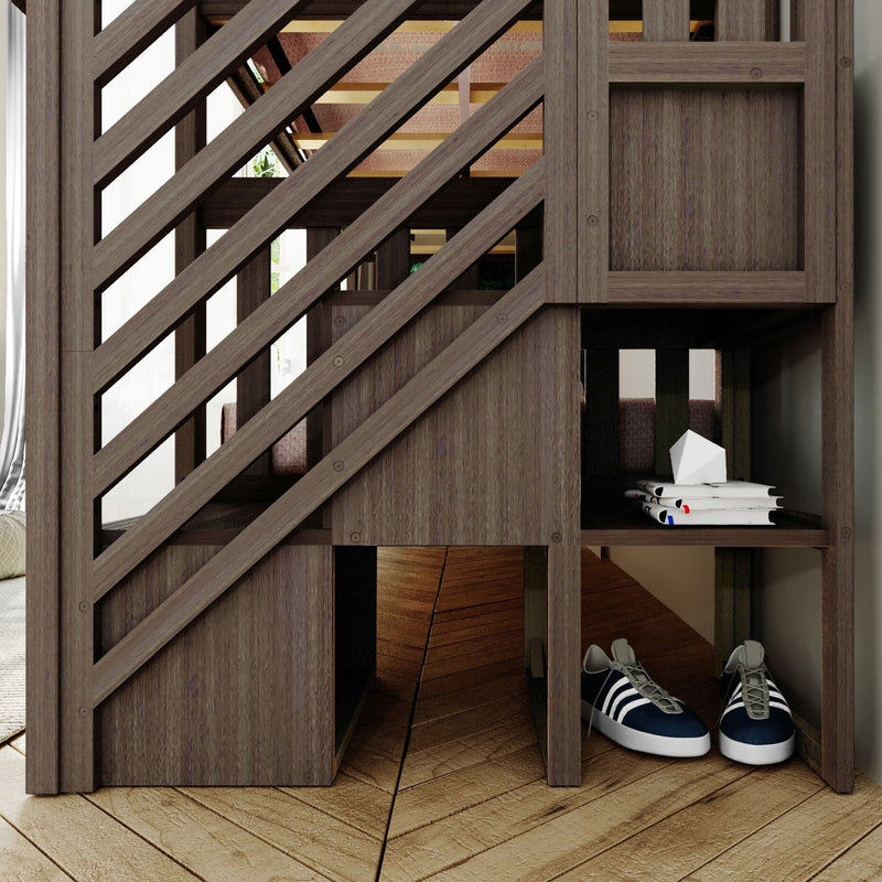 Modern wooden under-stair storage with diagonal slatted railing, built-in cubbies holding magazines and navy white sneakers on parquet floor