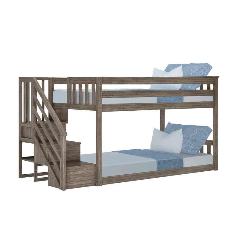 Gray wooden twin-over-full bunk bed with built-in staircase and storage, blue bedding and pillows, space-saving kids loft