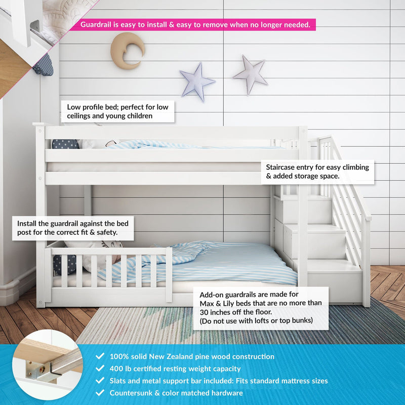 White wooden children's low-profile bunk bed with staircase storage and removable safety guardrail, blue striped bedding, moon and star wall decor, solid pine construction