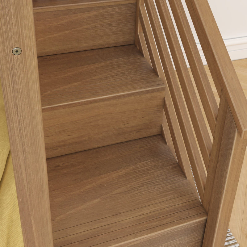 Close-up of natural oak wooden stairs and modern slatted wood railing showing hardwood treads and wood grain detail in a home interior