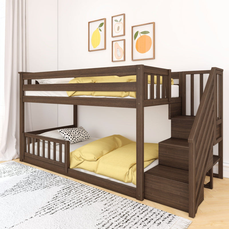 Dark wood space-saving bunk bed with staircase in a modern kids' bedroom, yellow bedding, fruit-themed wall art, white curtains and textured rug