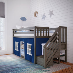 Wooden loft bed with stairs and blue curtain in modern children's bedroom.