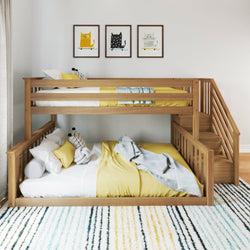 Stylish wooden bunk bed with yellow bedding in a modern kid's room with a striped rug and cat-themed wall art.