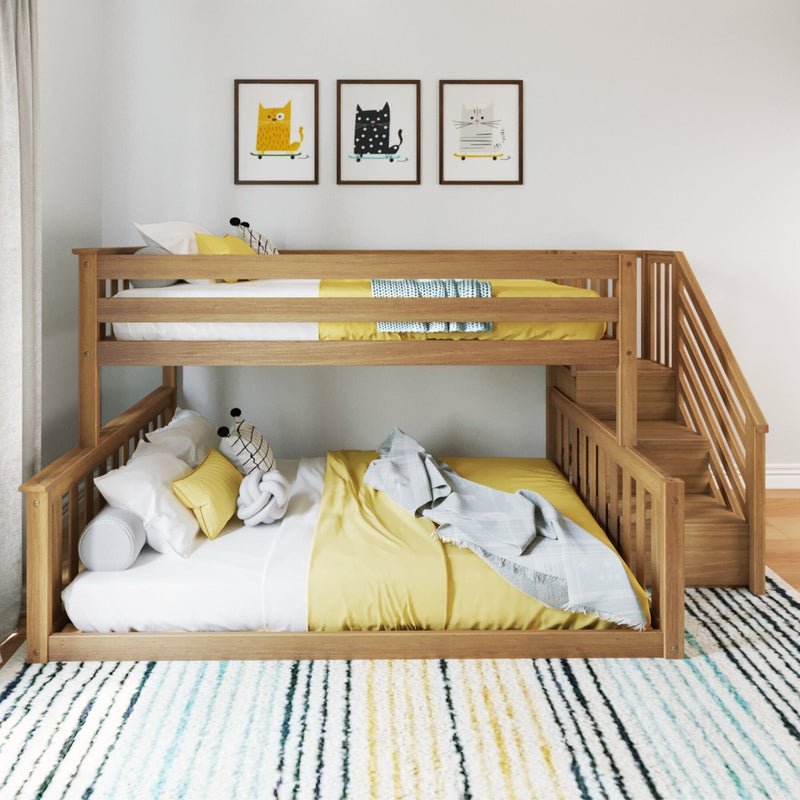 Stylish wooden bunk bed with yellow bedding in a modern kid's room with a striped rug and cat-themed wall art.
