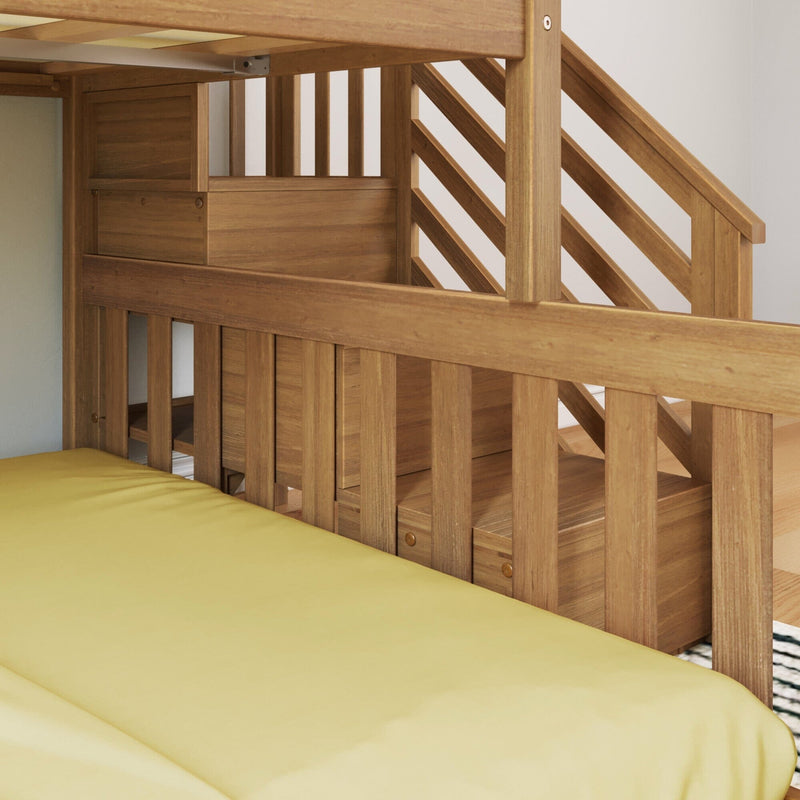 Close-up of solid oak bunk bed with built-in storage drawers, diagonal wooden staircase railing, and yellow mattress