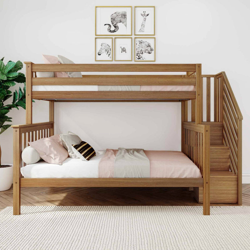Wooden bunk bed in modern children's bedroom with pink and gray bedding, staircase to top bunk, framed animal wall art, potted plant, hardwood floor and textured white rug