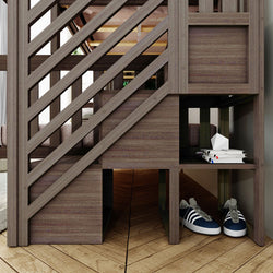 Modern wooden loft bed with diagonal slatted stairs and built-in cubby storage, navy sneakers and stacked books on a hardwood floor