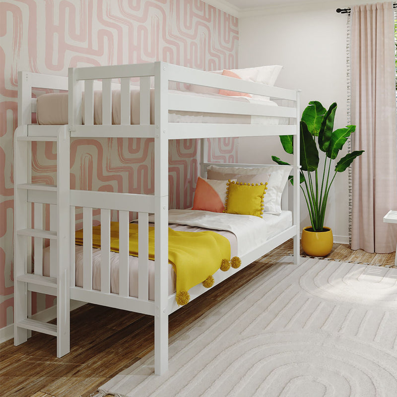 White wooden twin bunk bed in modern kids' bedroom with pink geometric wallpaper, yellow accents, potted plant and wood flooring
