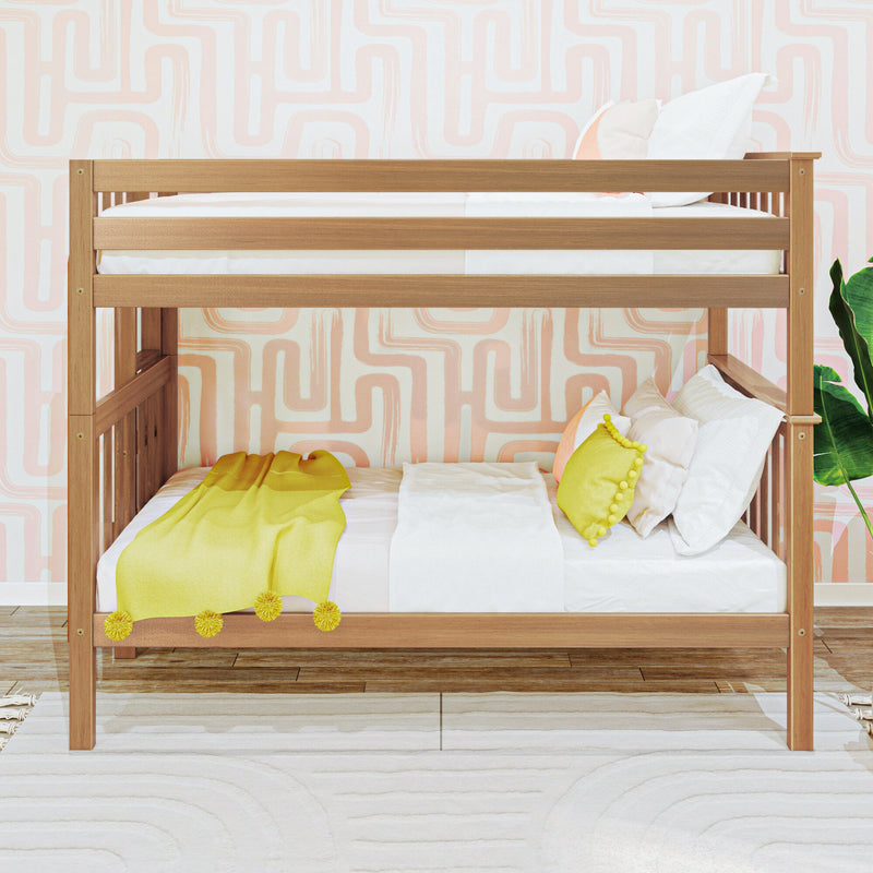 Natural wood bunk bed in modern kids bedroom with pastel pink geometric wallpaper, crisp white bedding and bright yellow throw blanket with pom-pom pillow