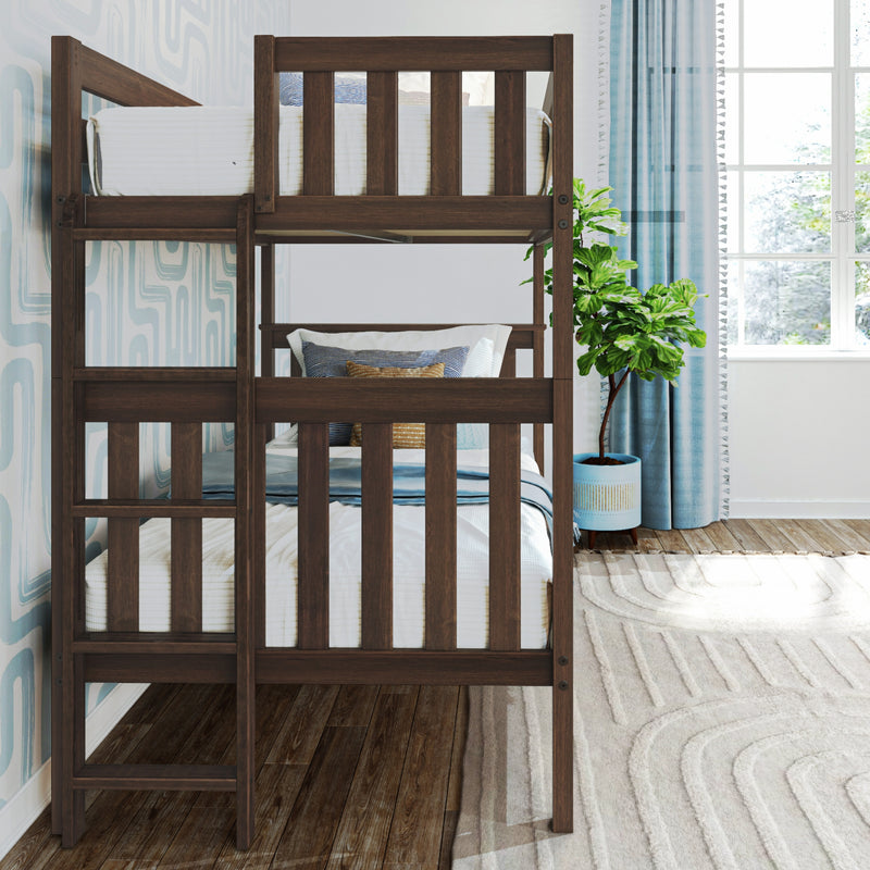 Dark walnut wooden bunk bed in a bright kids' bedroom with blue curtains, patterned aqua wallpaper, potted fiddle‑leaf fig, textured rug and natural light