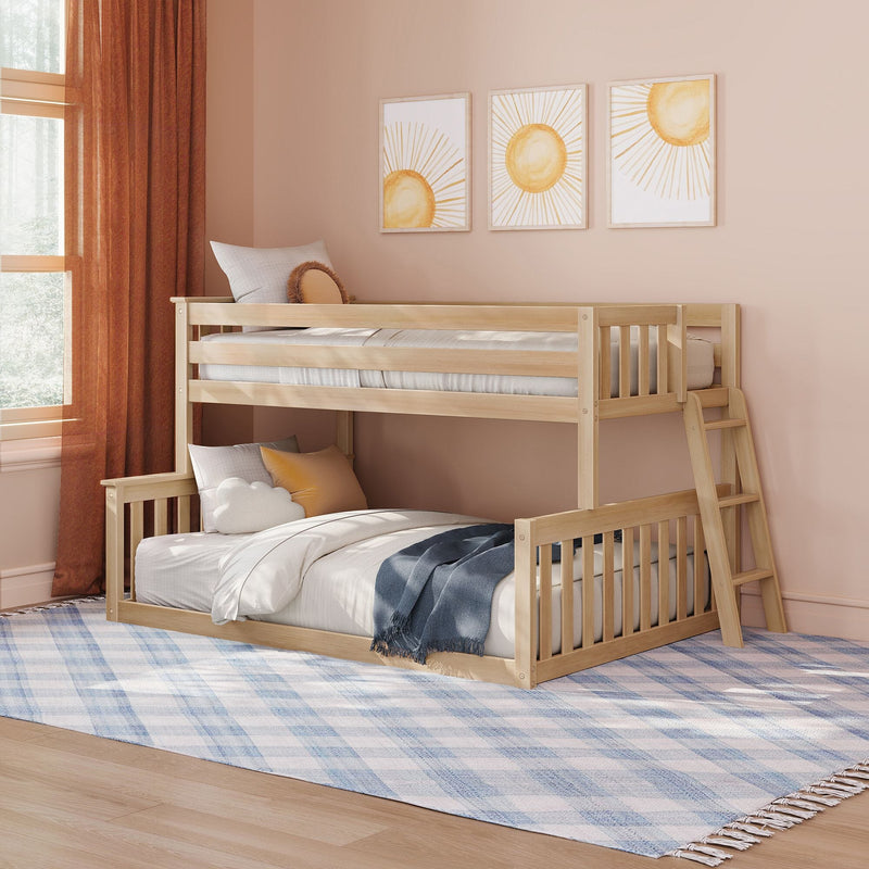 Natural wood bunk bed in cozy peach children's bedroom with sun-themed wall art, layered pillows, blue plaid rug and rust curtains