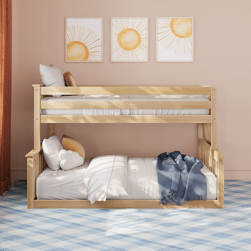 Wooden bunk bed in a neutral modern kids bedroom with sun wall art, white bedding, plush pillows, navy throw and blue plaid rug