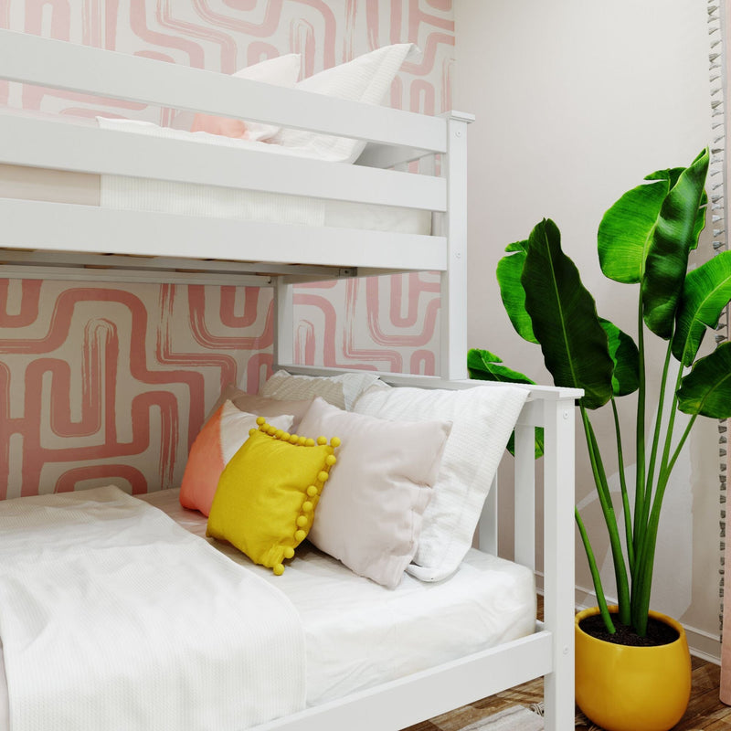 Modern white bunk bed with geometric pink wallpaper, vibrant yellow pillow, and potted plant for stylish bedroom decor.