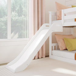 White bunk bed with slide in a children's bedroom, featuring pastel pillows and natural light from a large window.
