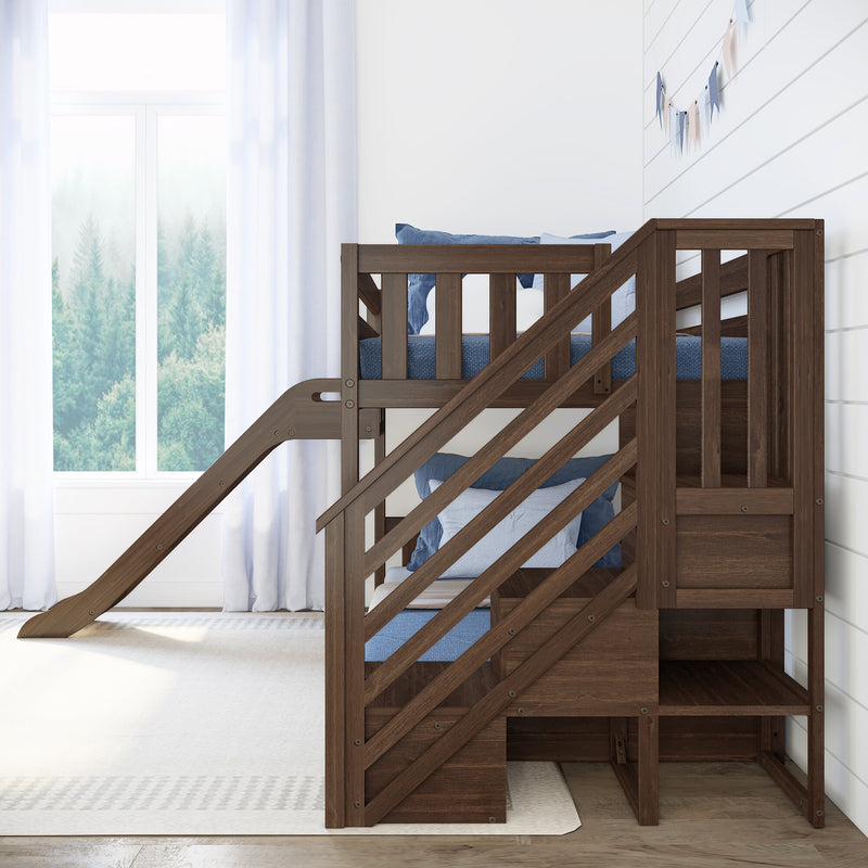 Modern wooden loft bunk bed with slide in bright children's bedroom, blue bedding, white shiplap wall and forest-view window