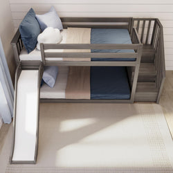 Wooden bunk bed with slide and storage stairs in a children's room.