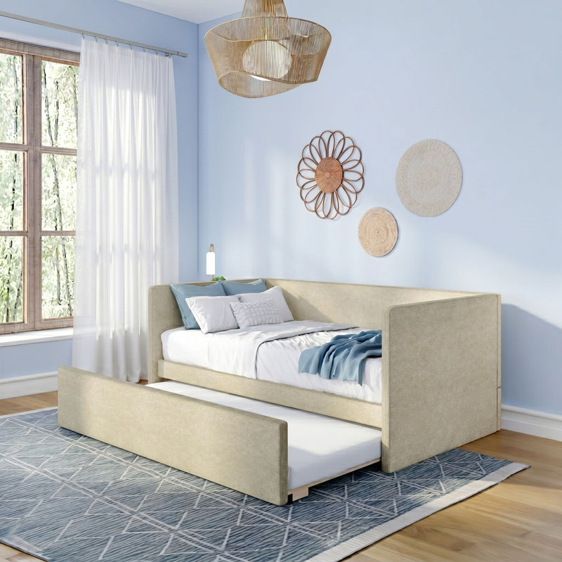 Modern light-blue bedroom with neutral upholstered trundle bed, geometric rug, sheer curtains and boho rattan wall decor