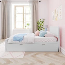 Pastel pink children's bedroom with white storage platform bed, pastel pillows and throw, large window with curtains and potted plant