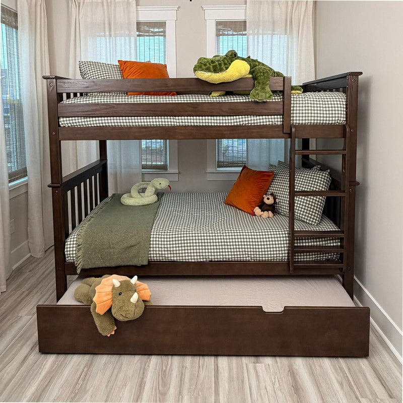 Dark wood bunk bed with pull-out trundle, green gingham bedding, orange accent pillows and plush animals (crocodile, snake, monkey, triceratops) in a bright children's bedroom, kids' bedroom decor