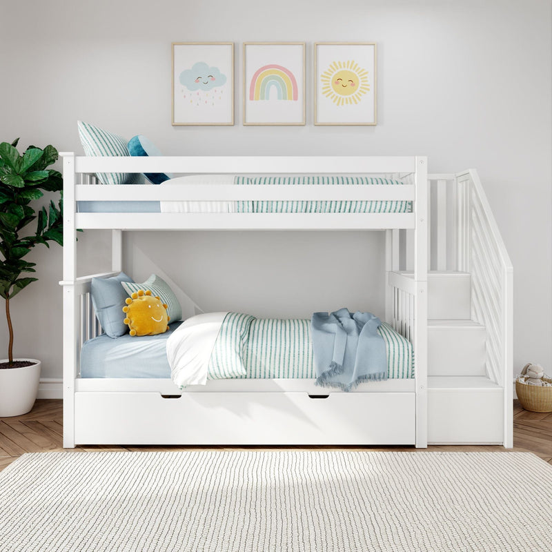 White wooden twin-over-twin bunk bed with staircase and under-drawer storage in modern kids' bedroom, blue-striped bedding, yellow sun plush, rainbow and cloud wall art, and potted plant