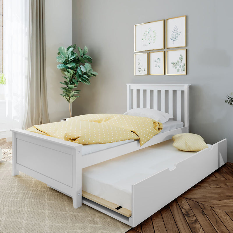 White wooden kids bed with pull-out trundle, yellow polka dot bedding, botanical framed wall art and indoor plant in modern nursery bedroom