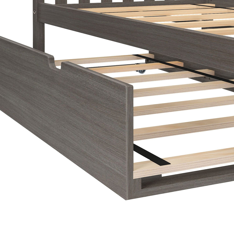 Modern gray wood platform bed frame with wooden slats and black central metal support beam, close-up of slatted mattress base