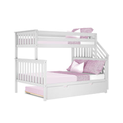 White twin-over-full bunk bed with pink bedding and storage drawer.