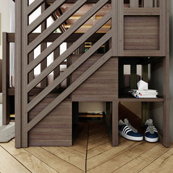 Wooden staircase with under-storage shelves and sneakers on a hardwood floor.