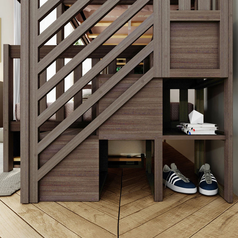 Modern rustic wooden loft bunk bed with diagonal slat railing and built-in storage cubbies holding magazines, white geometric decor and navy sneakers on hardwood floor
