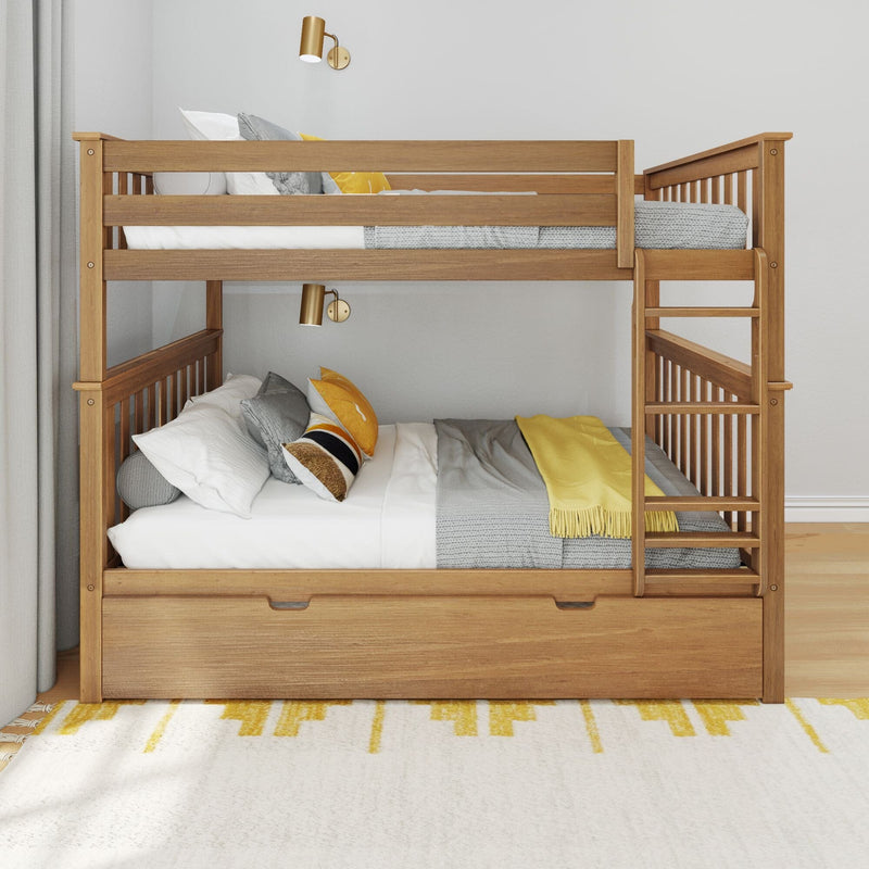 Wooden twin-over-full bunk bed with built-in ladder and under-bed storage drawer in natural oak finish, styled with gray and yellow bedding and brass wall sconces in a modern kids' bedroom