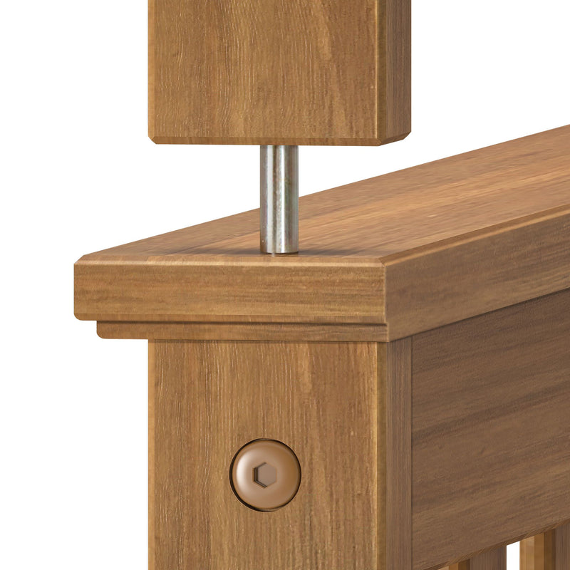 Close-up of oak wood stair newel post and railing showing wood grain finish, metal dowel pin and hex-socket bolt fastener, stair railing balustrade detail