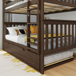 Dark wood bunk bed with pull-out trundle, featuring cozy pillows and blankets in a bright bedroom setting.