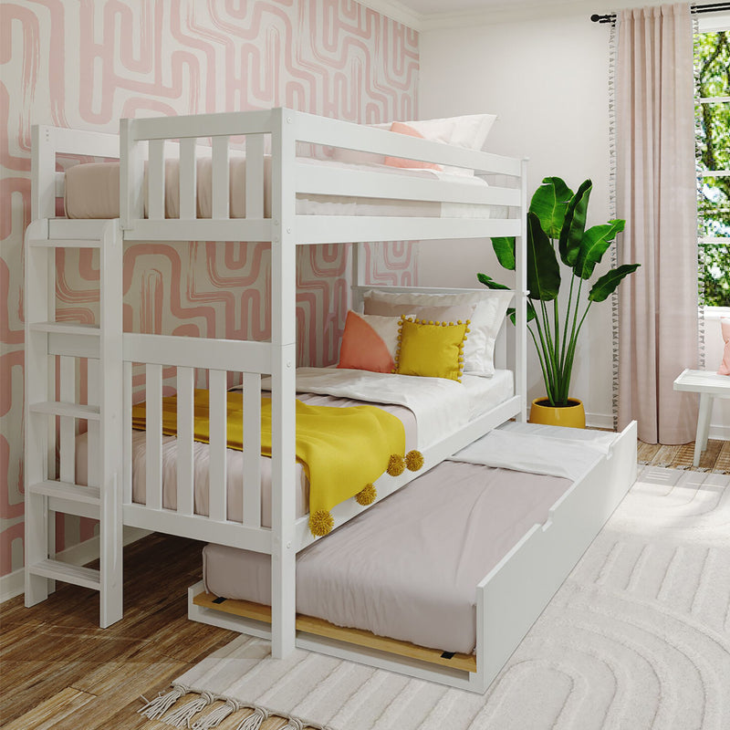 White wooden bunk bed with pull-out trundle in a modern kids' bedroom featuring pink abstract wallpaper, yellow throw blanket and accent pillows, potted tropical plant and sunlit window
