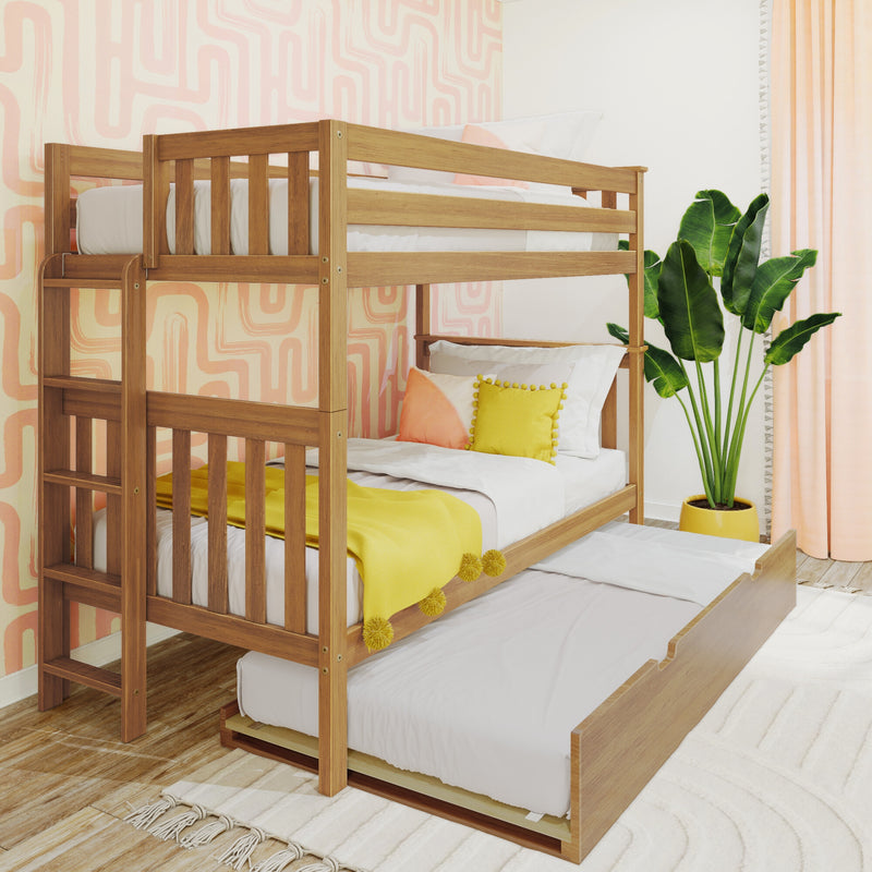 Solid wood bunk bed with pull-out trundle and white bedding in modern kids' bedroom with pink geometric wallpaper, yellow accent pillows and potted tropical plant