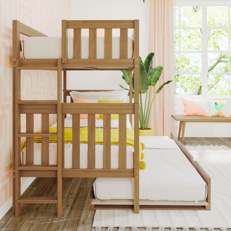 Natural wood bunk bed with yellow bedding in a bright children's bedroom with pastel pink walls, sheer curtains and potted plant