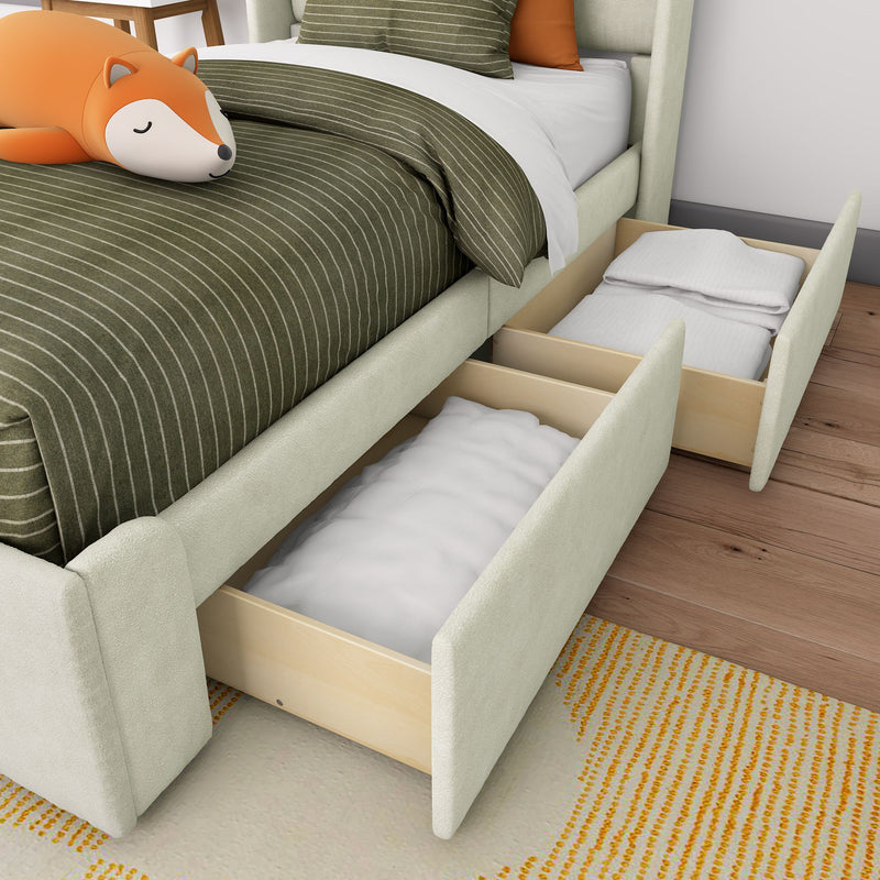 Under-bed storage drawers in upholstered beige bed with olive green striped bedding and a fox plush pillow