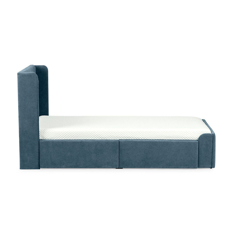Blue upholstered modern platform bed frame with tall headboard and white textured mattress on white background