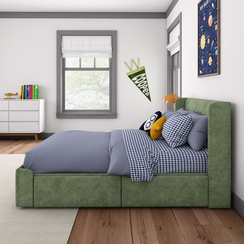 Modern kids bedroom with green upholstered bed, blue gingham bedding, owl pillow, rocket toy, space poster and "Cooper" pennant by window and dresser
