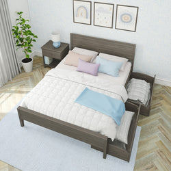 Cozy bedroom with modern dark wooden bed frame, soft pastel pillows, and convenient under-bed storage drawers.