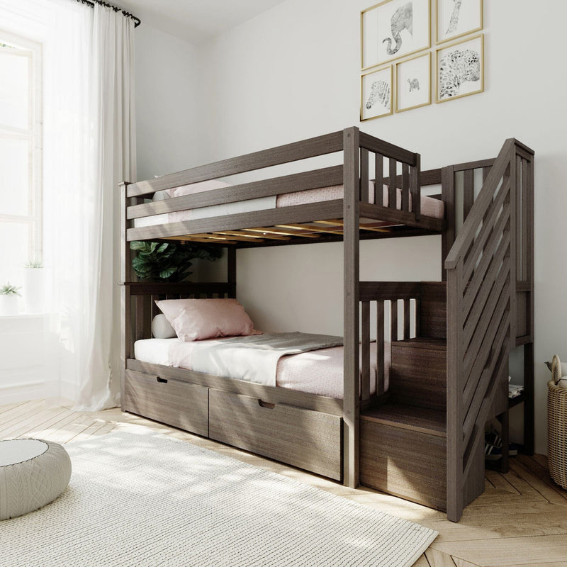Modern dark wood twin-over-twin bunk bed with stairs and under-bed drawers in a bright minimalist kids' bedroom with pink bedding, sheer curtains and animal wall art