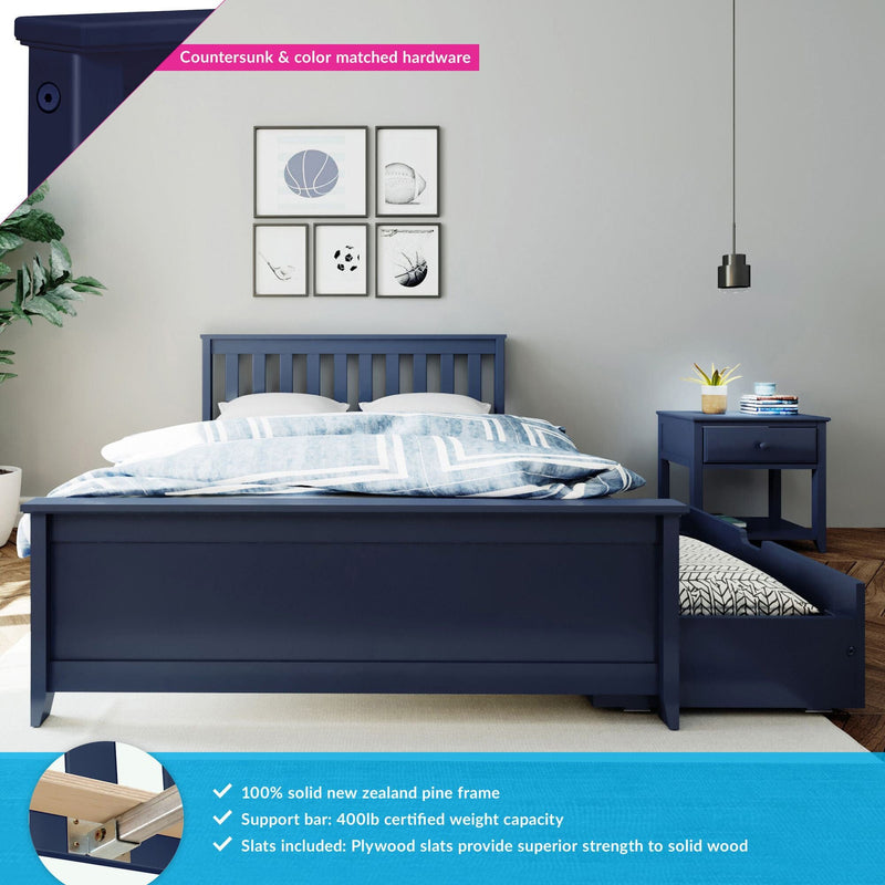 Navy blue solid wood bed frame with pull-out trundle drawer and matching bedside table, blue patterned duvet, pendant light and framed sports prints in a modern kids' bedroom